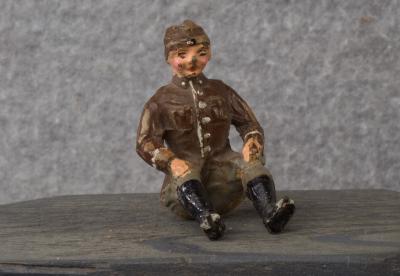 WWII German Toy Seated Soldier 