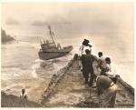 WWII Coast Guard Press Photo Grounded PT Boat